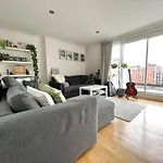Central Duplex With City Skyline